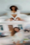 Nude woman massaging woman